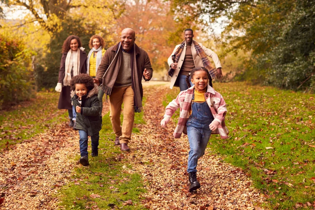 Family running in woods