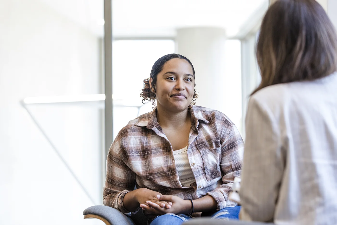 Woman listening to friend