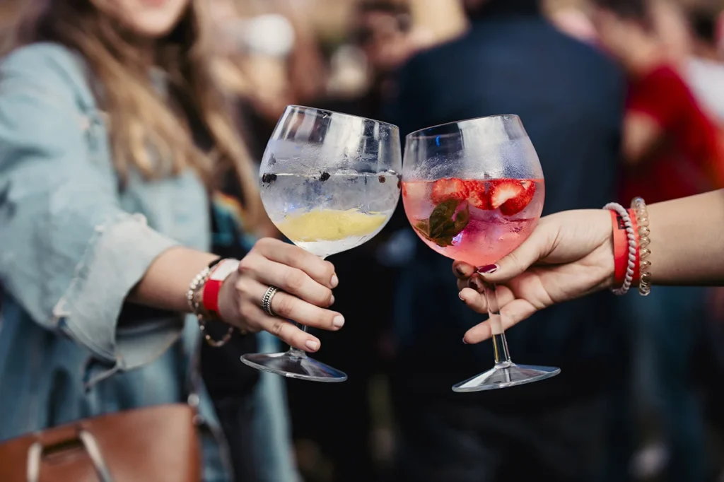 Clicking glasses of cocktails