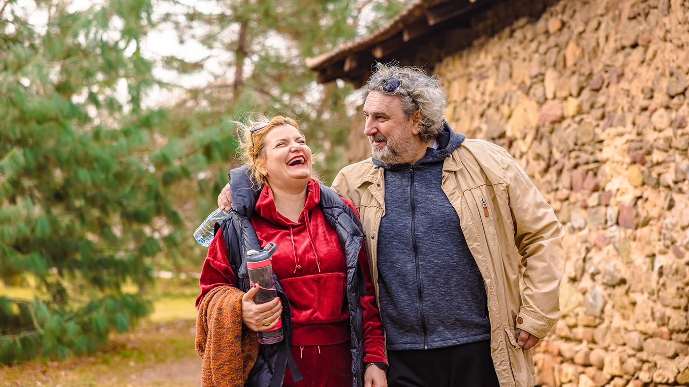 Smiling overweight couple