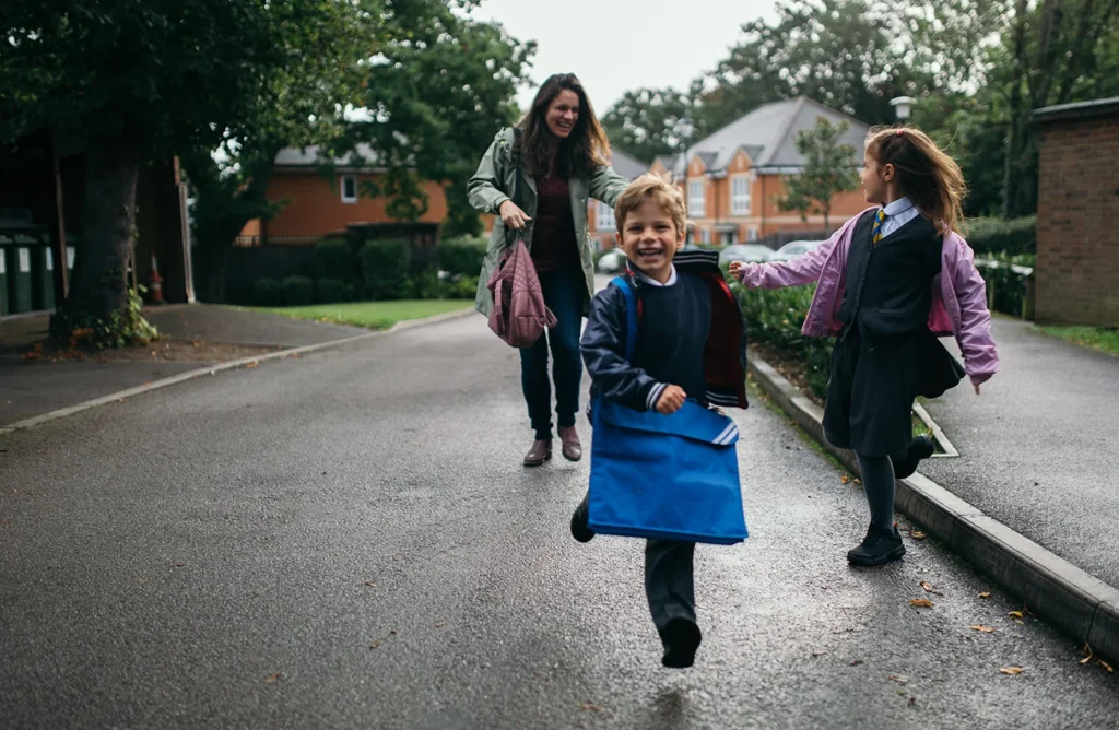 Mum and children on school run